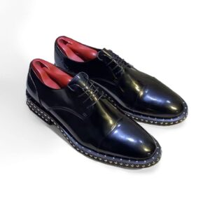 Studded sole oxfords